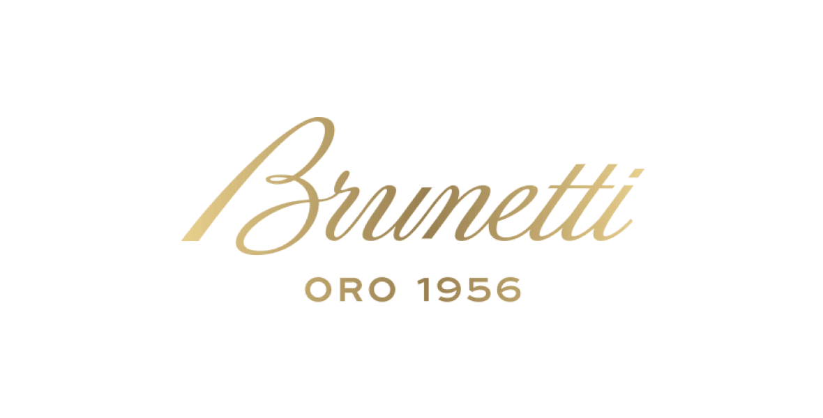 Gold cursive text elegantly spells out Brumetti with ORO 1956 nestled below, set against a blue background reminiscent of Melbournes vibrant web design scene.